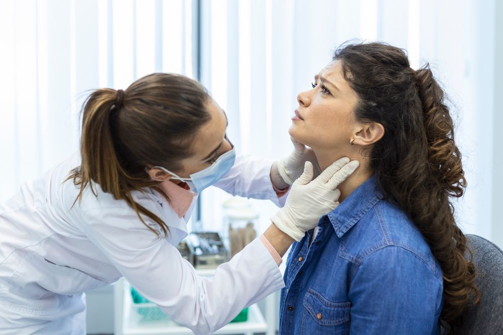 a women is getting tmj treatment