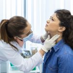 a women is getting tmj treatment